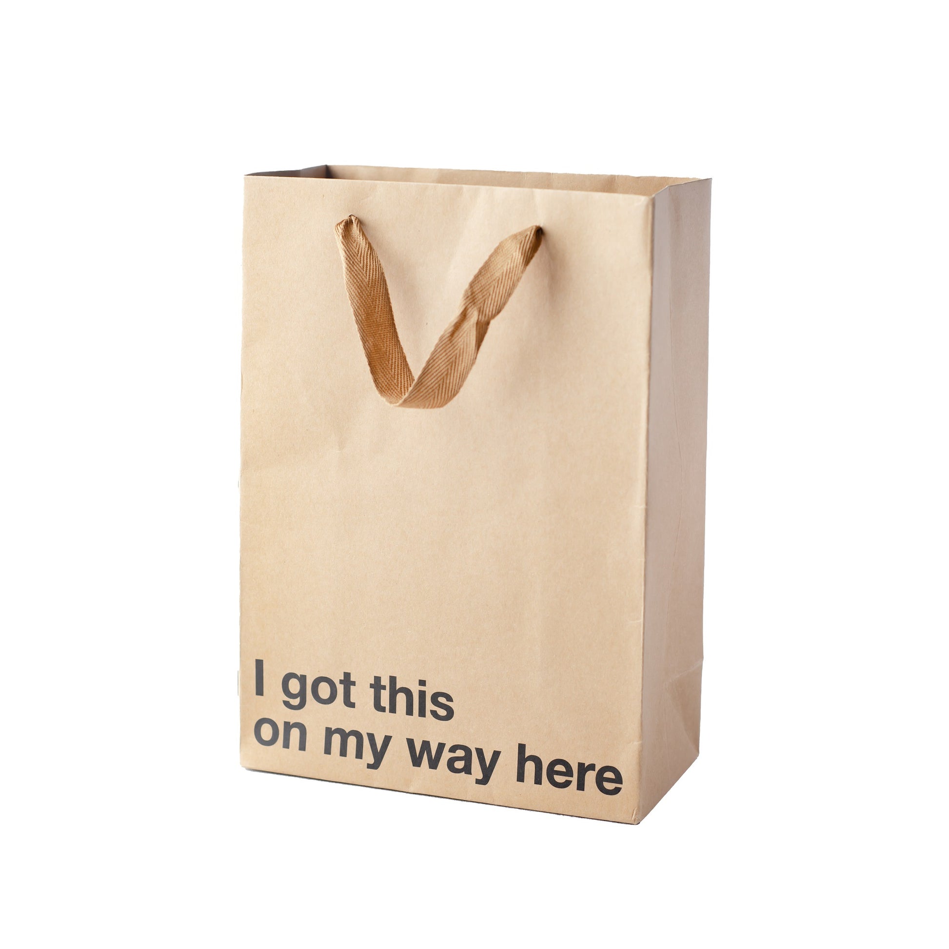 "I Got This On My Way Here" kraft gift bag – Funny adult gift bag with brown ribbon.