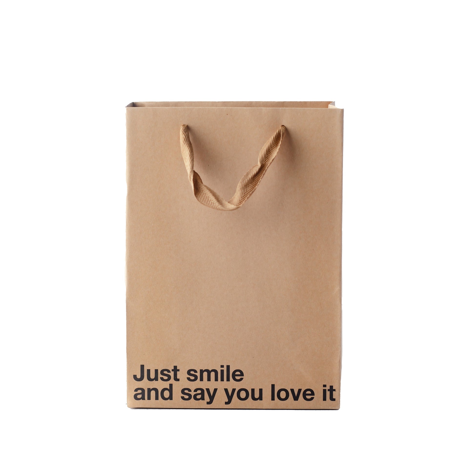 "Just Smile" kraft gift bag – Funny and unique adult gift bag with a brown ribbon.