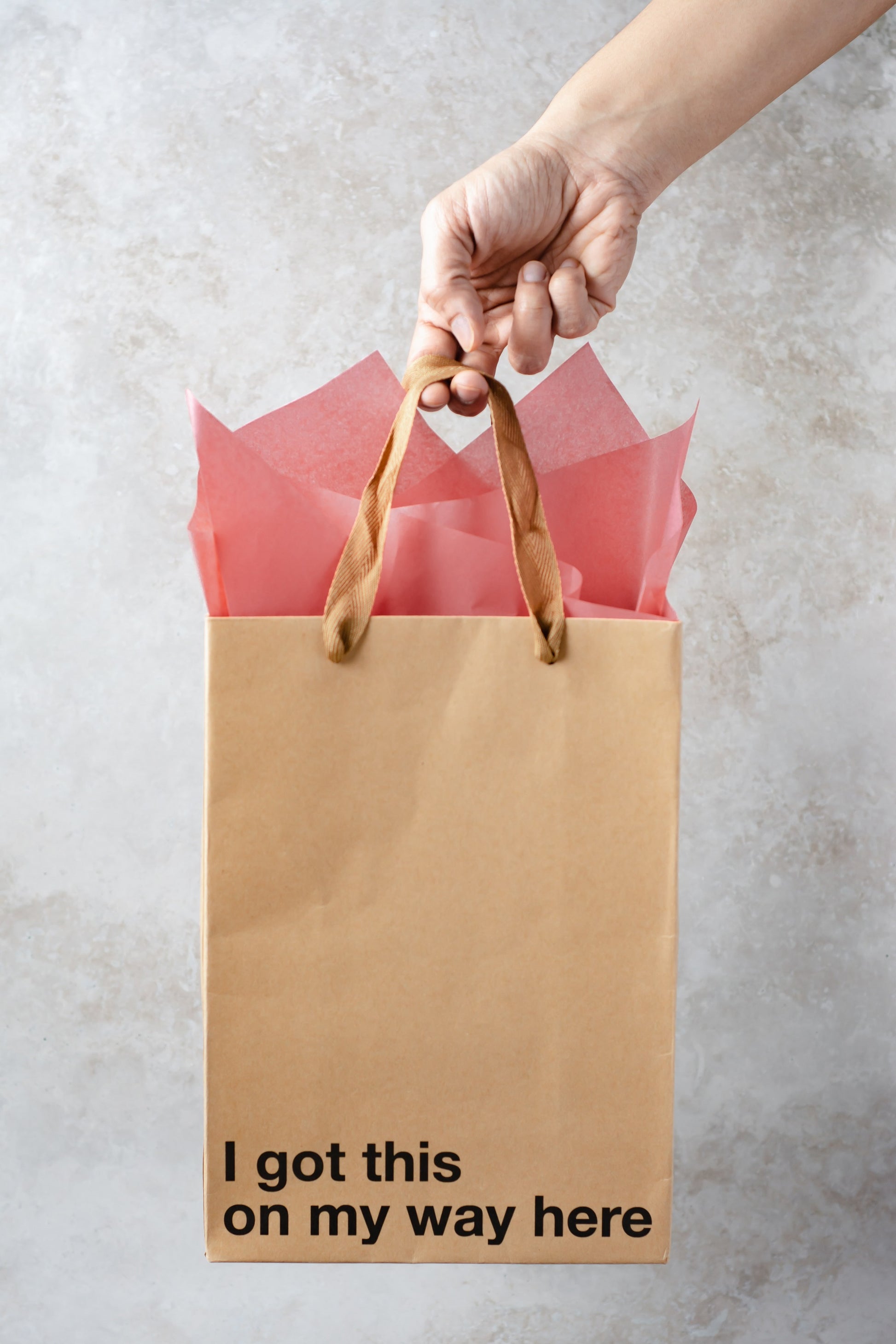 "I Got This On My Way Here" kraft gift bag – Funny adult gift bag with brown ribbon.