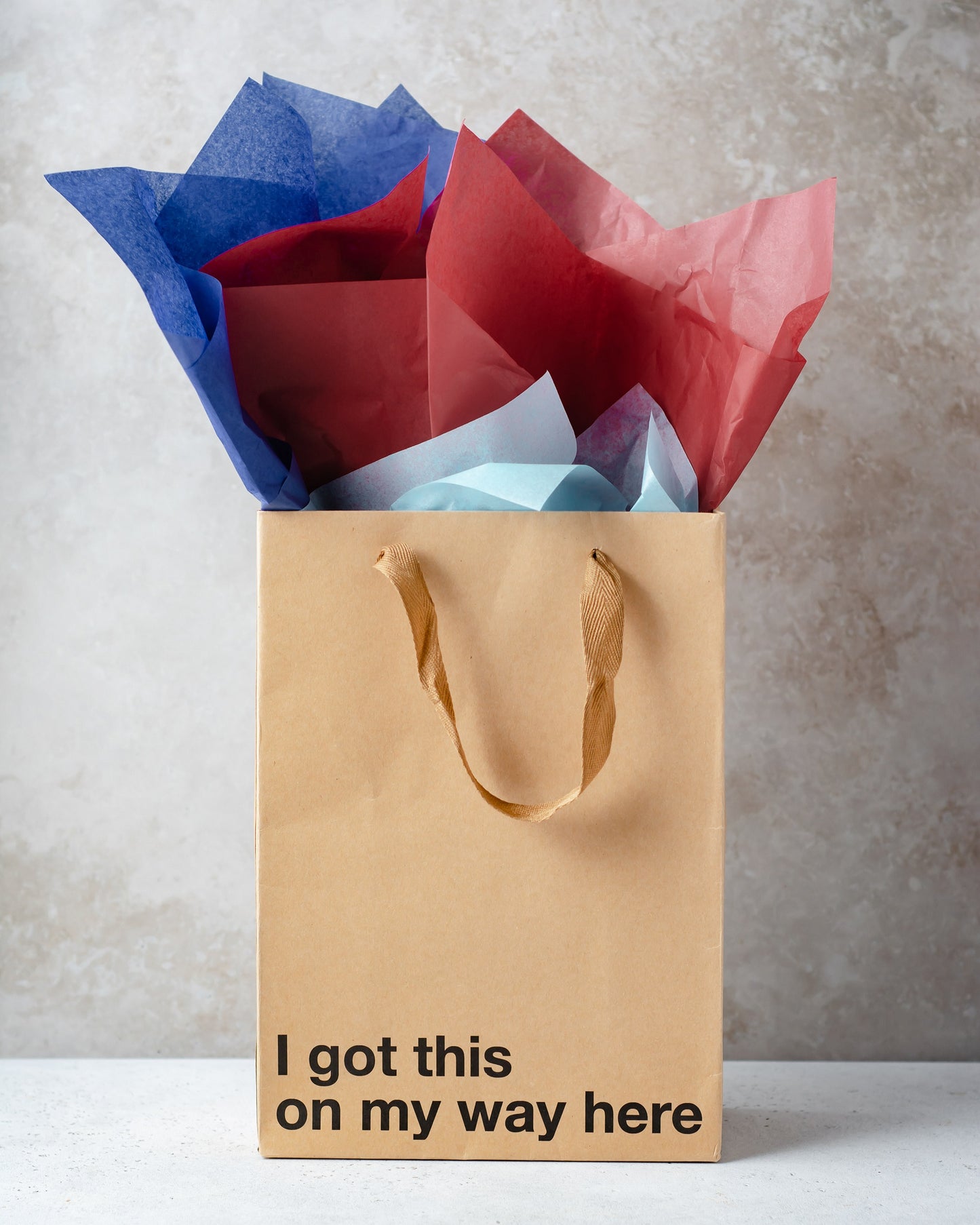"I Got This On My Way Here" kraft gift bag – Funny adult gift bag with brown ribbon.