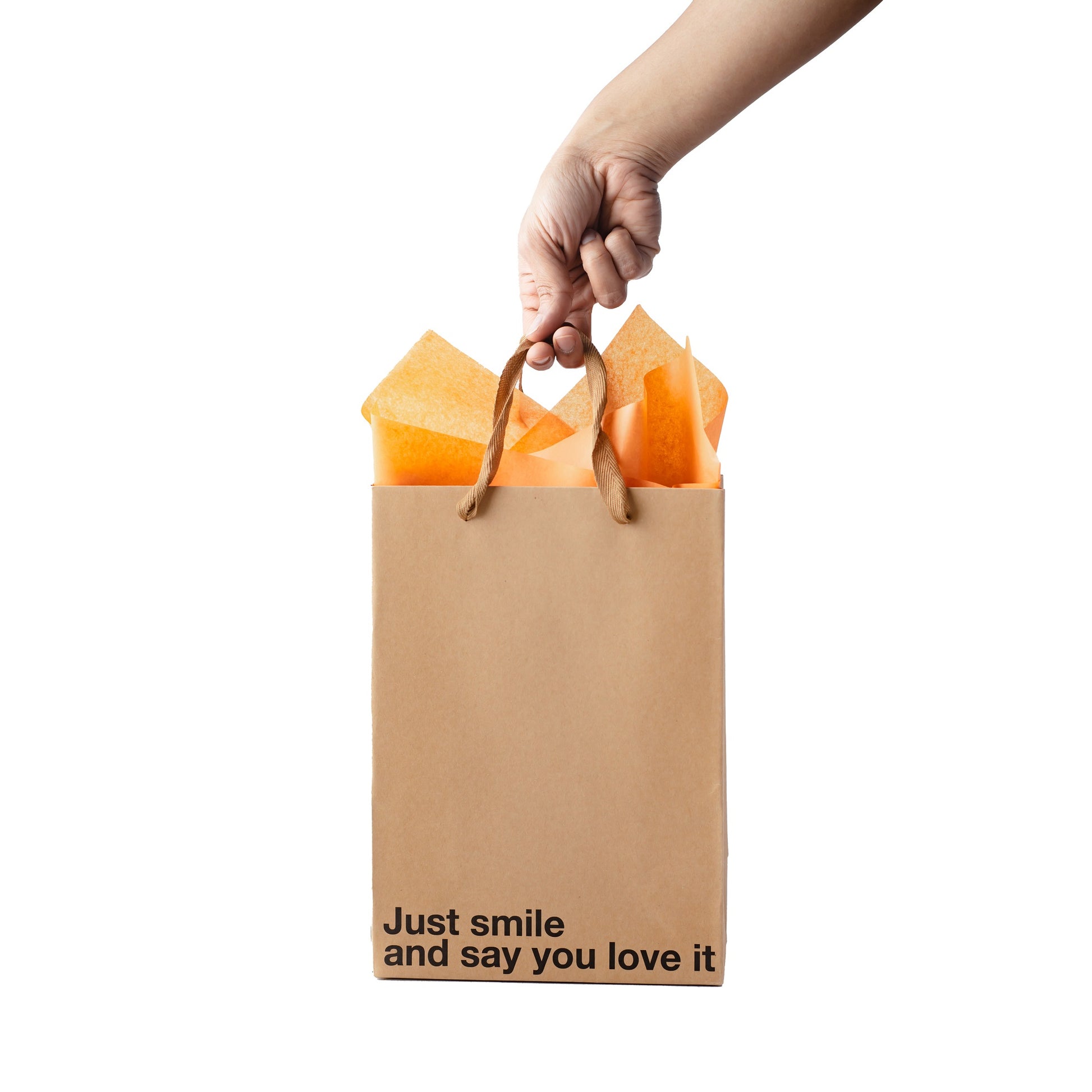 "Just Smile" kraft gift bag – Funny and unique adult gift bag with a brown ribbon.