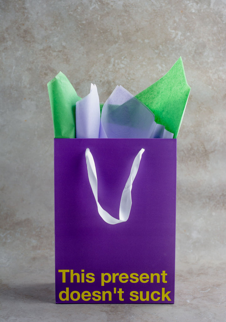 "This present doesn't suck" Purple Gift Bag