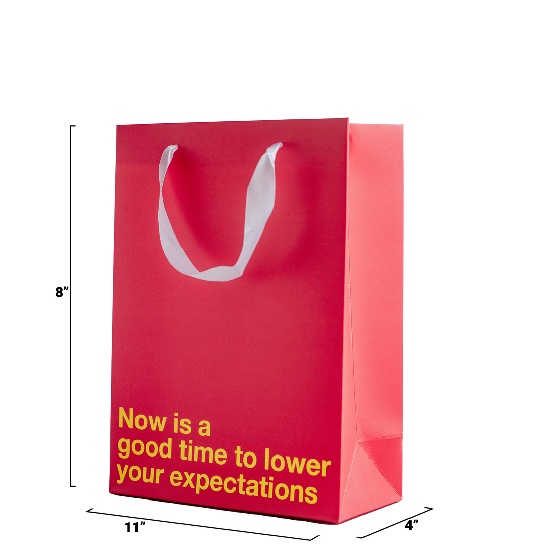 "Lower your expectations" Red Gift Bag - Offensive Crayons