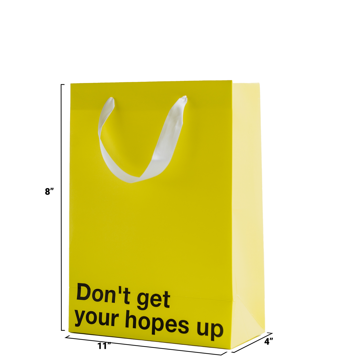 "Don't Get Your Hopes Up" yellow gift bag – Funny, snarky kraft gift bag with white ribbon.