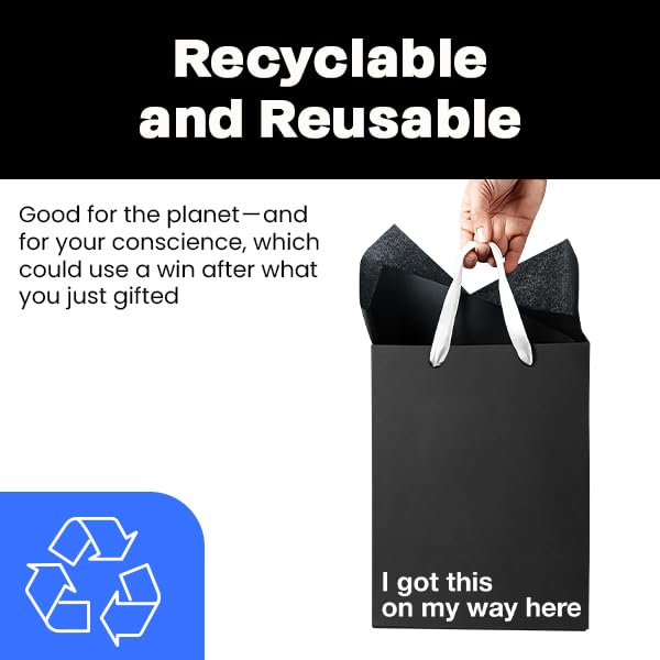 Funny gift bags with a person holding a reusable gift bag featuring the phrase 'I got this on my way here'.