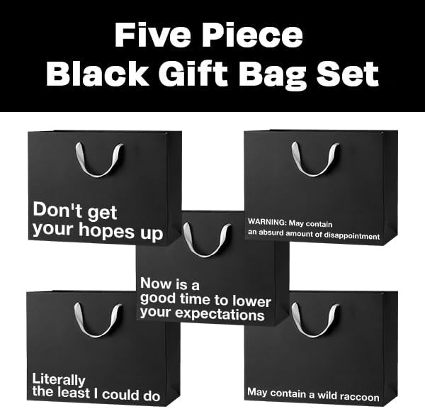 Five black funny gift bags with humorous messages like 'Don't get your hopes up' and 'May contain a wild raccoon'.