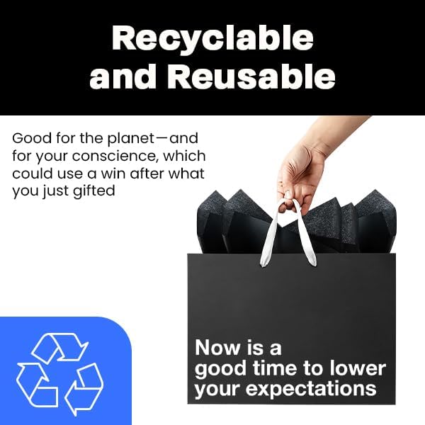 Recyclable and reusable funny gift bags holding black bags, perfect for lowering expectations in gift-giving.