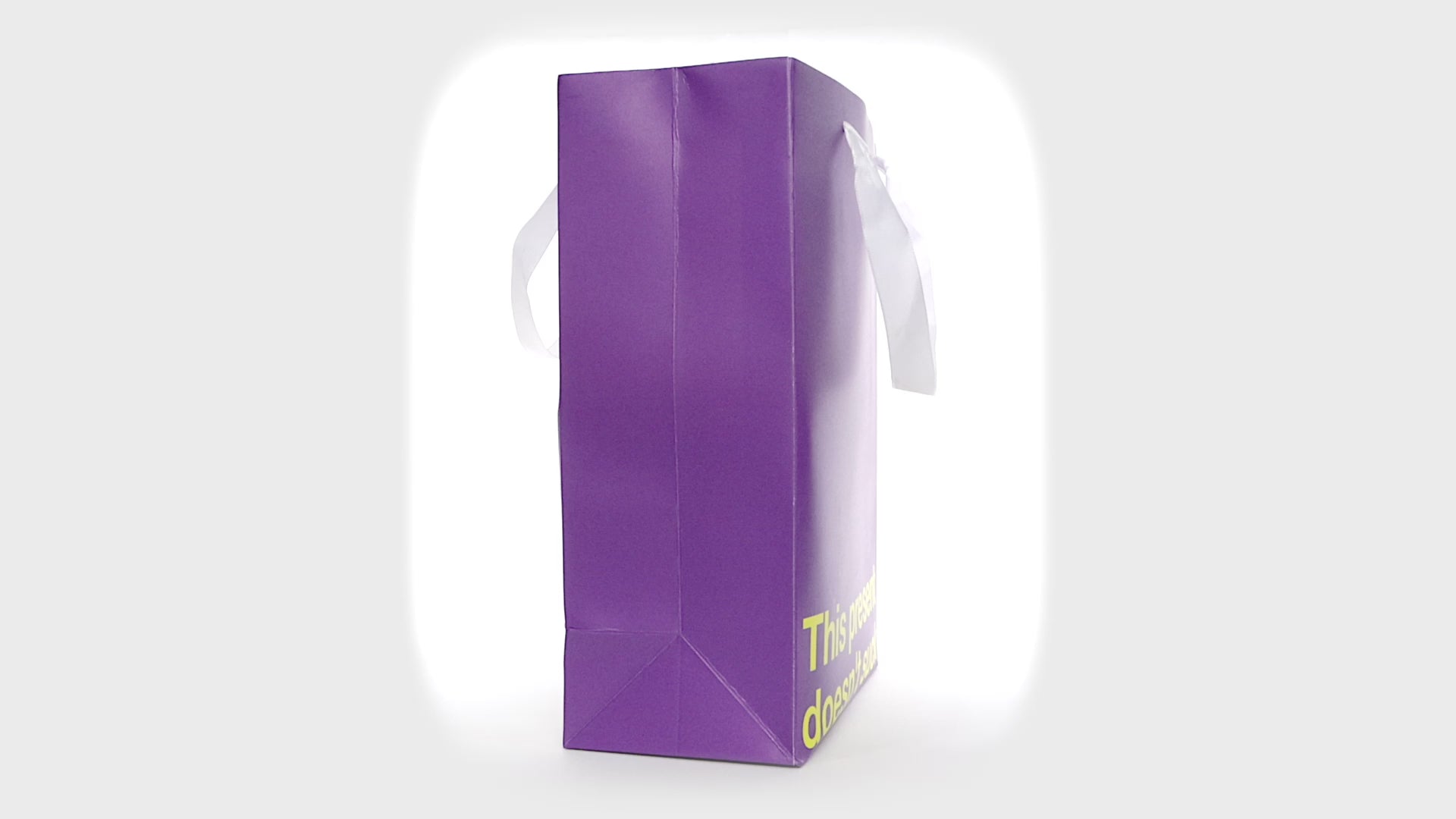 Purple kraft gift bag with funny design – ideal for adult gifts.