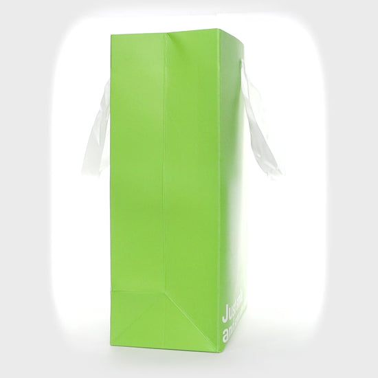 "Just Smile and Say You Love It" green kraft gift bag – Funny, unique adult gift bag.