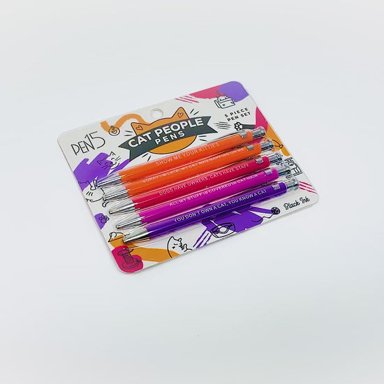 Sarcastic pens with cat-themed designs and witty phrases for cat lovers.