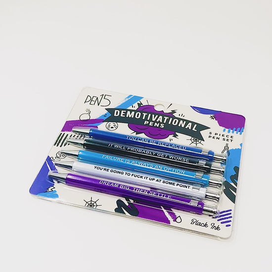 Set of demotivational pens with sarcastic phrases, perfect for dark humor lovers.